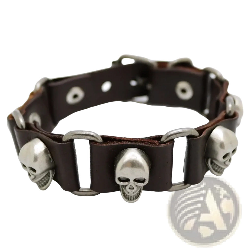 Dark brown leather punk bracelet with silver-toned metal skulls and studs for edgy fashion statement