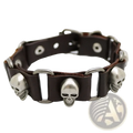 Dark brown leather punk bracelet with silver-toned metal skulls and studs for edgy fashion statement