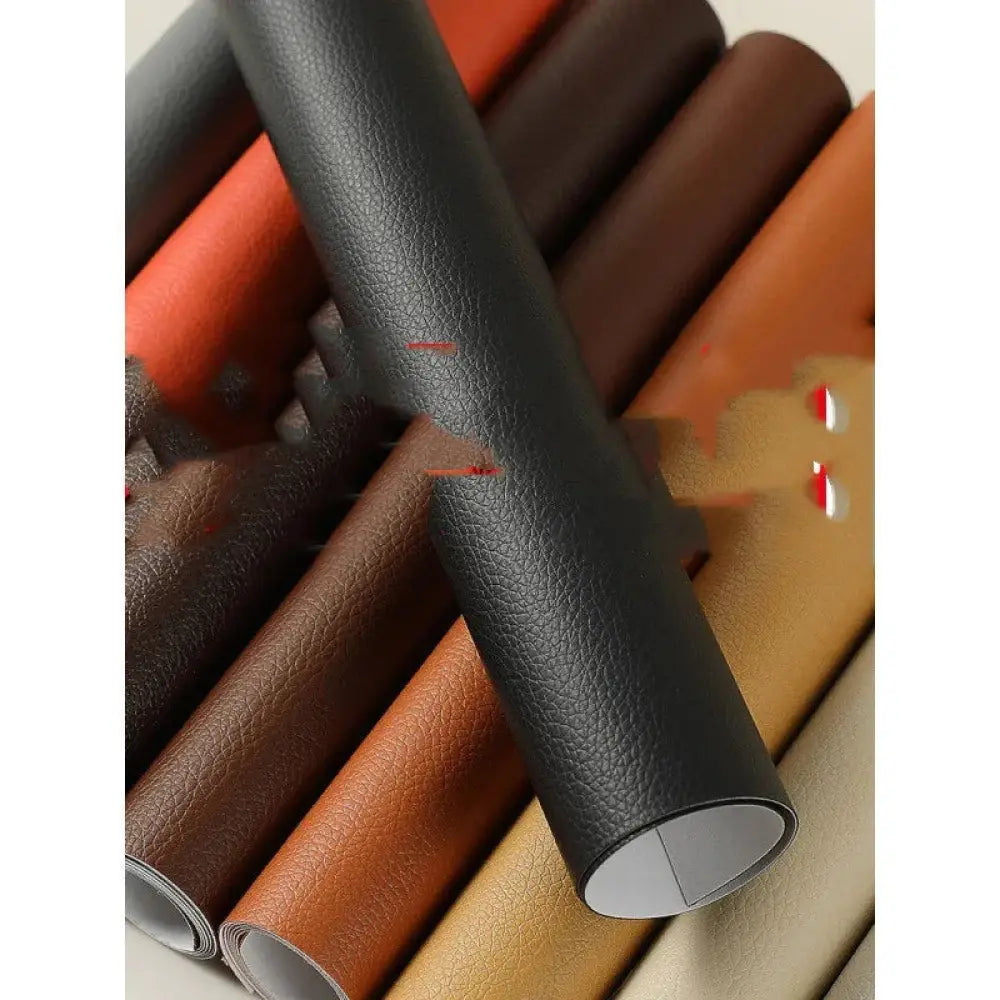 Black self adhesive pebbled leather repair patch roll made of textured black faux leather with a pebbled surface