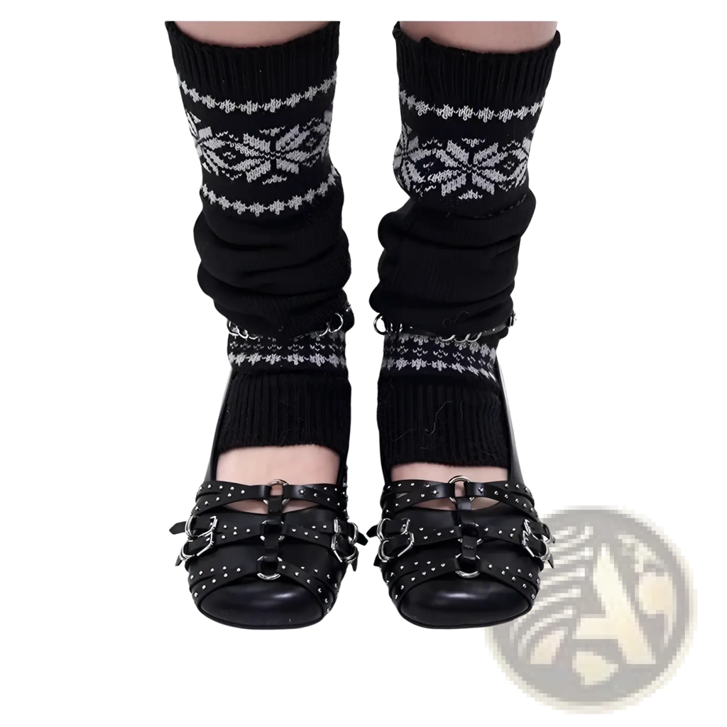 Black leather mary jane pumps with silver studded buckle straps in a retro design