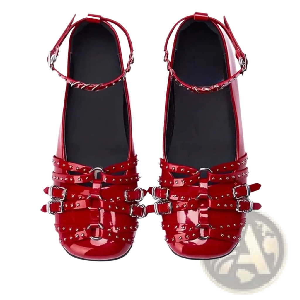 Leather retro pumps in red patent leather with silver-toned studded buckle straps and platform heels