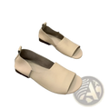Cream-colored leather slip-on sandals with a minimalist design and soft low-profile sole for casual wear