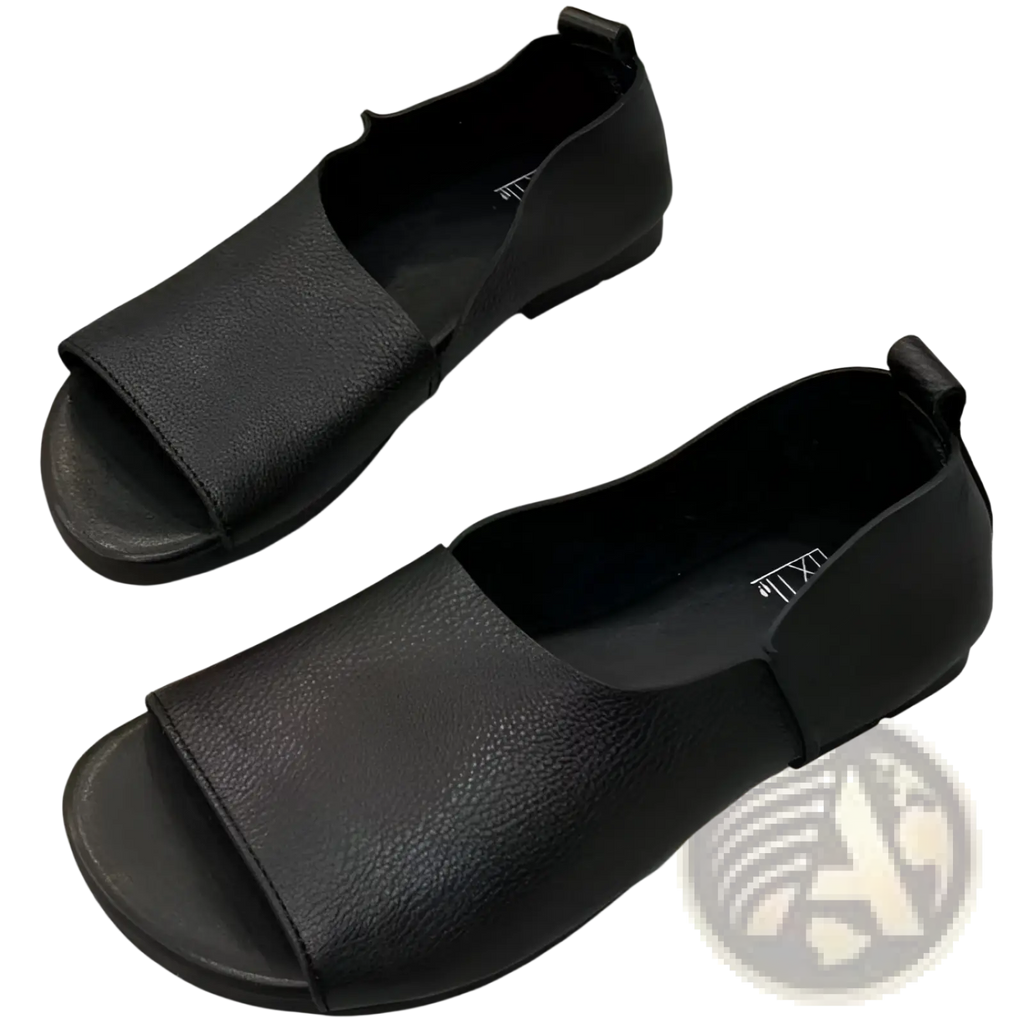 Black leather slip-on sandals with a retro soft sole and peep-toe design featuring a textured surface