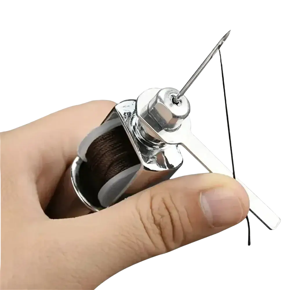 A sleek chrome-finished leather sewing awl kit thread spool with built-in needle and tension mechanism
