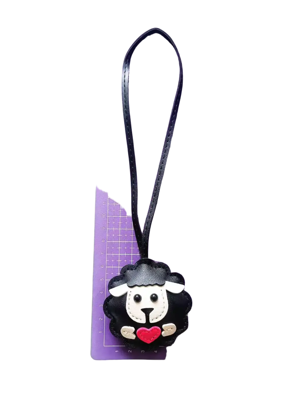 Black sheep-shaped leather keychain with white face red heart and black strap cute animal bag charm