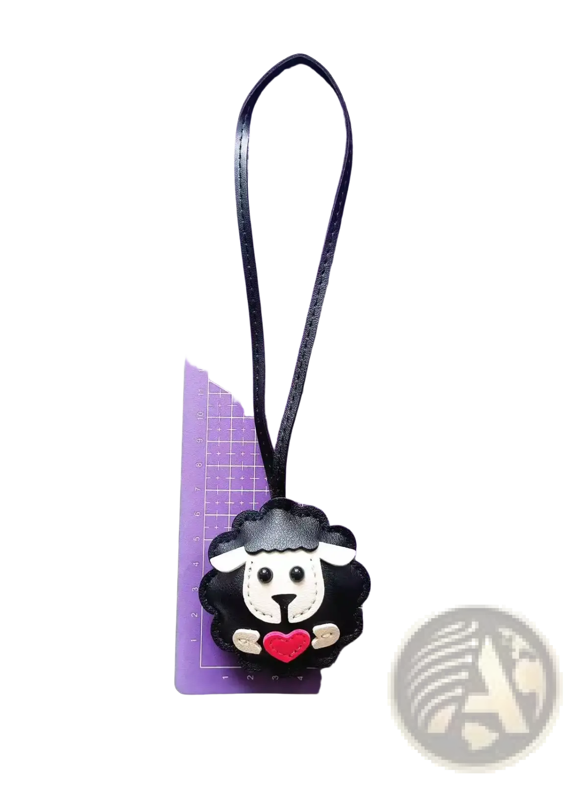 Black sheep-shaped leather keychain with white face red heart and black strap cute animal bag charm