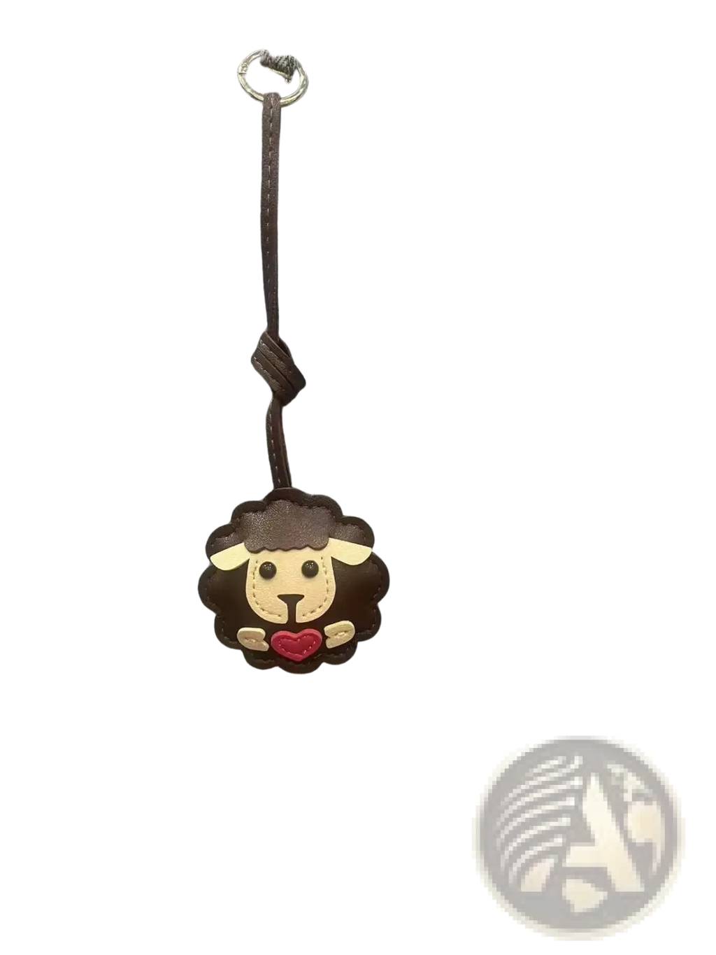 Leather sheep keychain in brown featuring a cute animal design with red heart patch and stitched details for bags
