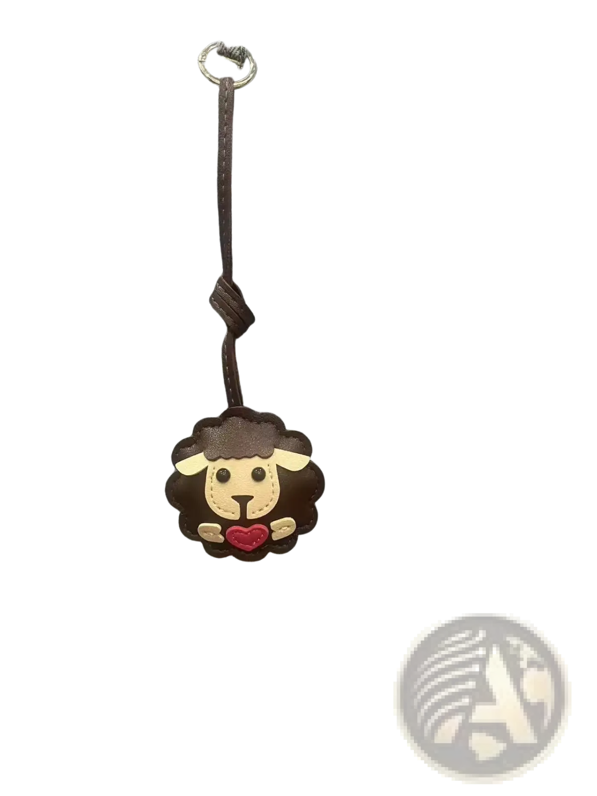Leather sheep keychain in brown featuring a cute animal design with red heart patch and stitched details for bags
