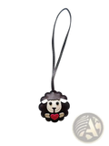 Leather sheep keychain made of black leather with white face, red heart, and gold accents as a cute animal bag charm