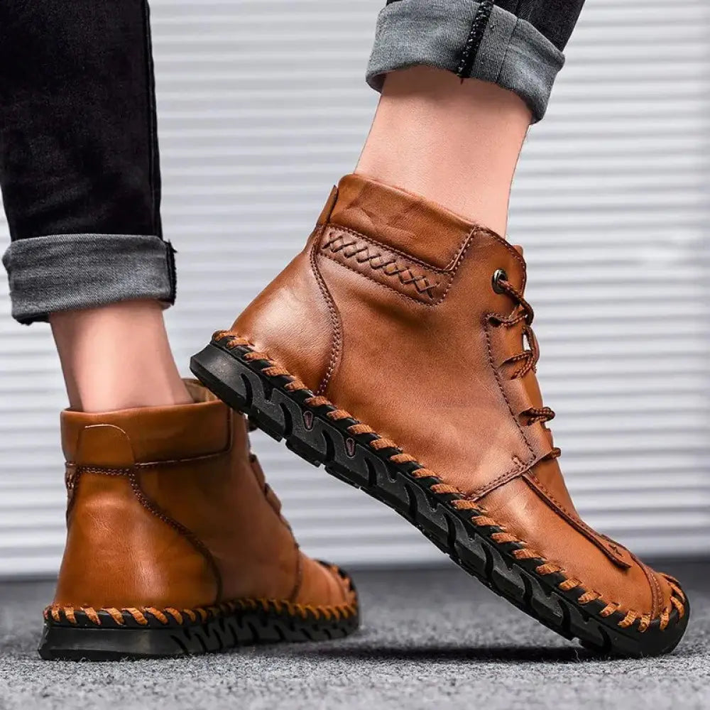 Arbaglobal men’s handcrafted brown leather casual ankle boots with black rubber soles and braided stitching detailing