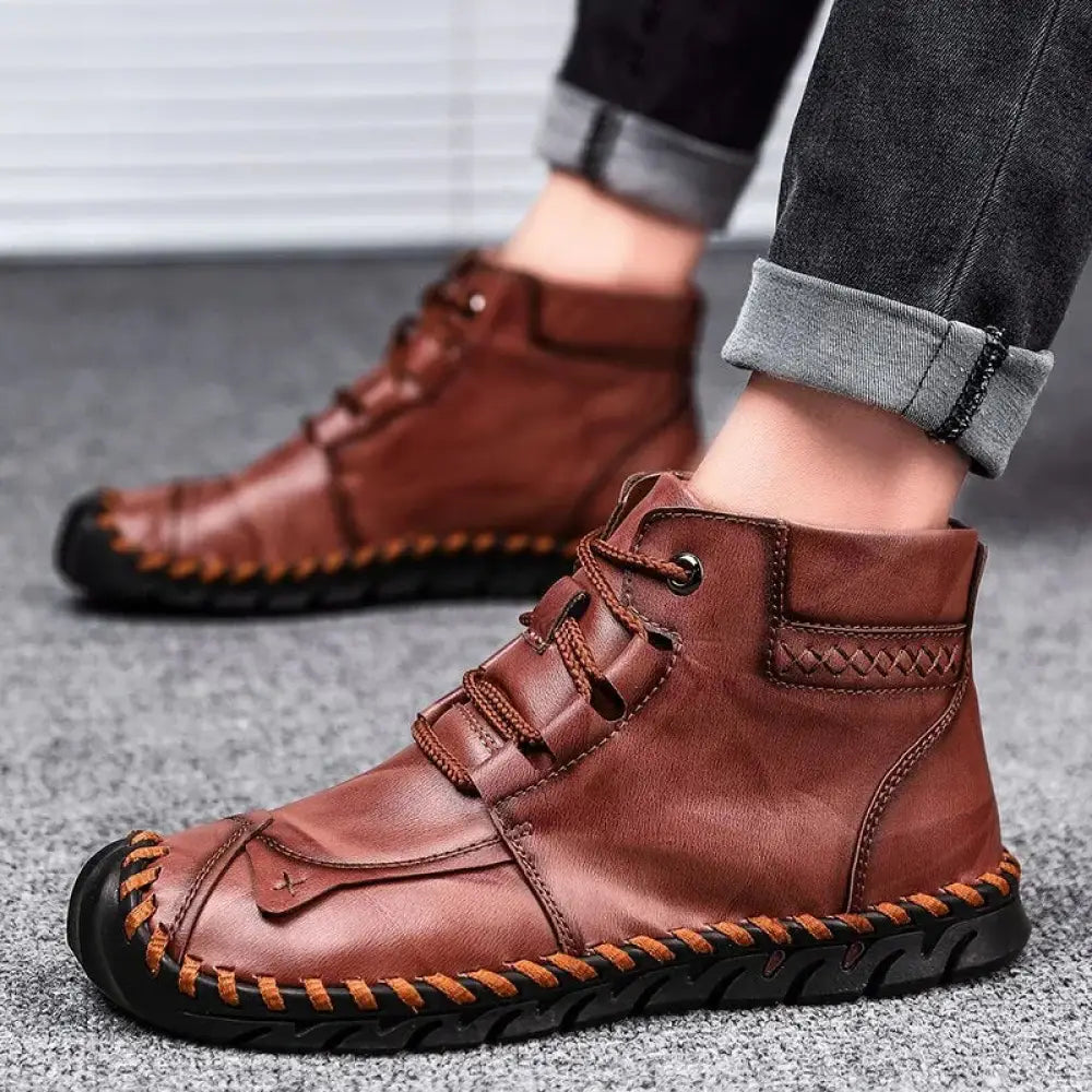 Arbaglobal men’s handcrafted brown leather casual ankle boots with lace-up design black rubber soles and decorative stitching