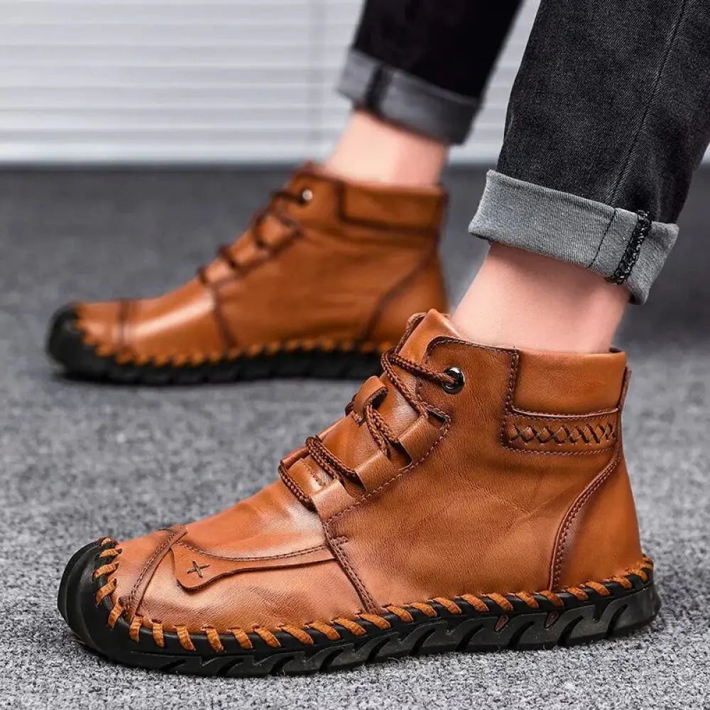 Arbaglobal men’s handcrafted leather casual ankle boots in brown with visible stitching and rugged black rubber sole