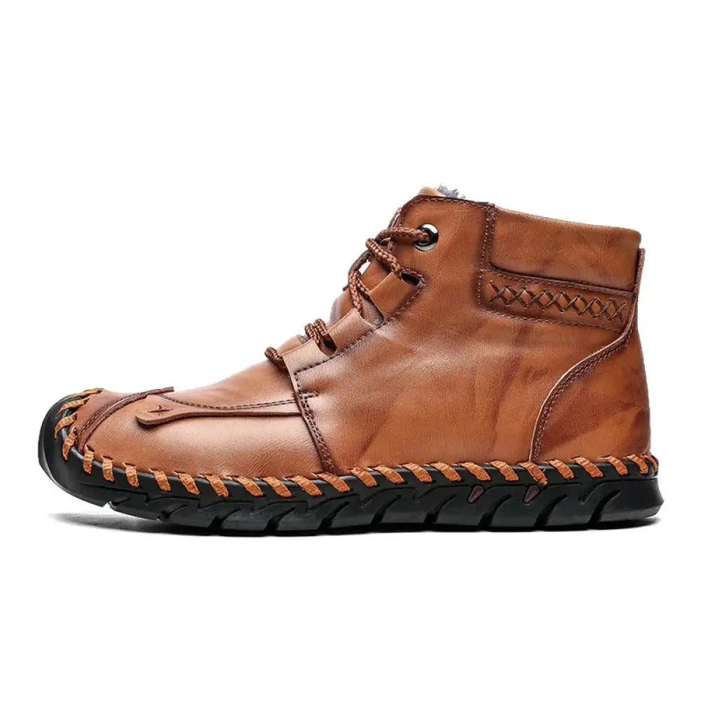 Brown leather ankle boot with visible stitching and black rubber sole from Arbaglobal men’s handcrafted casual collection