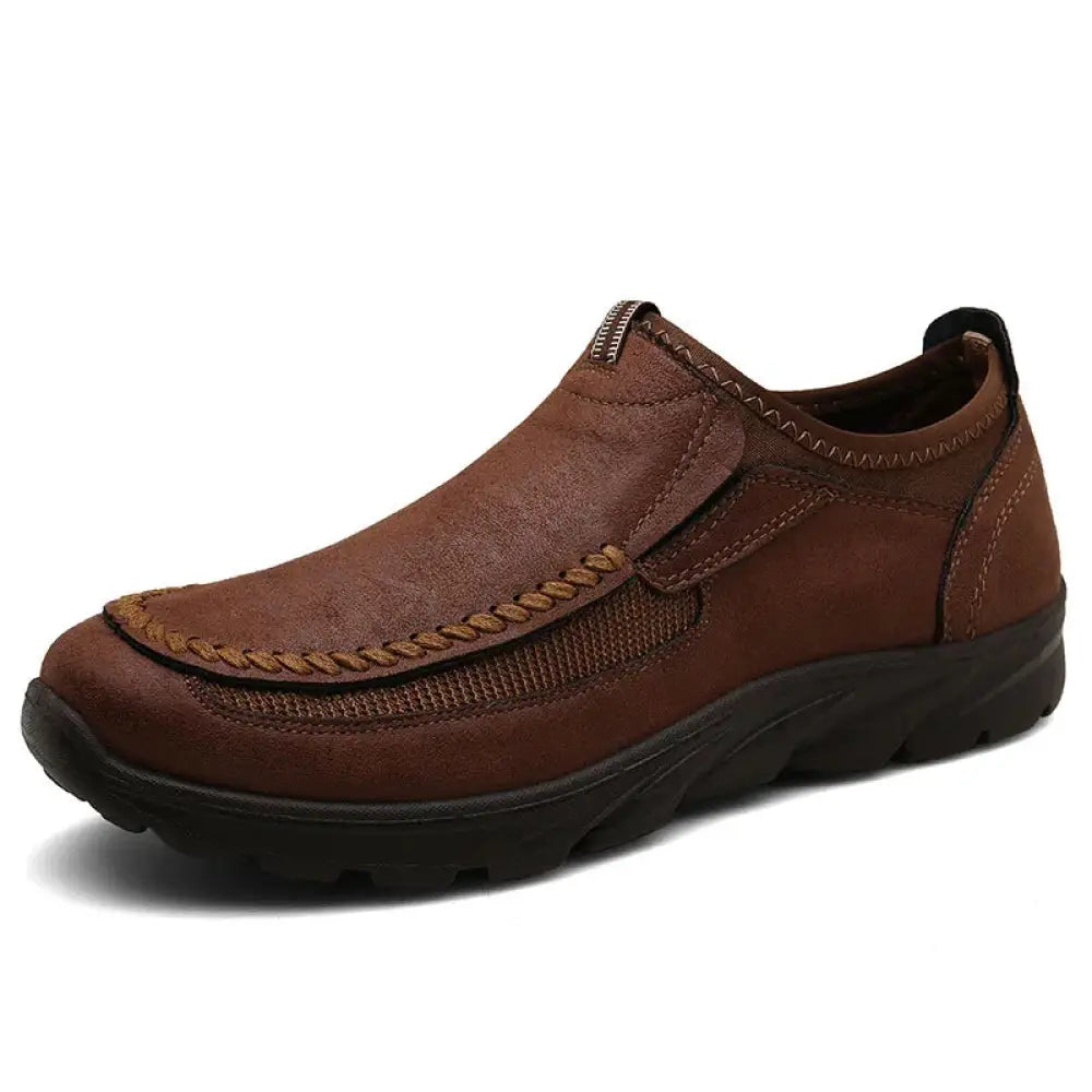 Men’s british leather textured slip-on casual shoe in brown with mesh side panel and black rubber sole