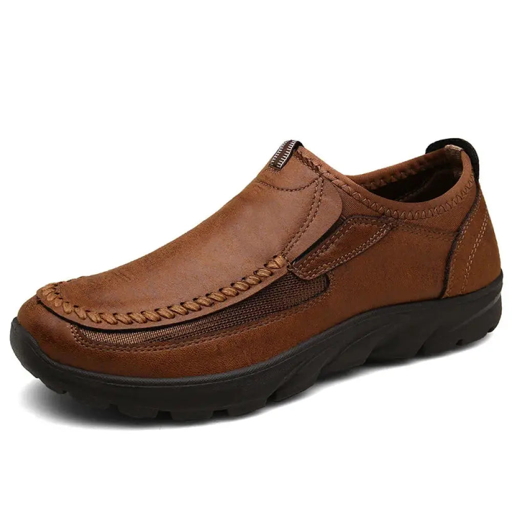 Men’s British leather slip-on casual shoe in brown with textured sole and decorative stitching