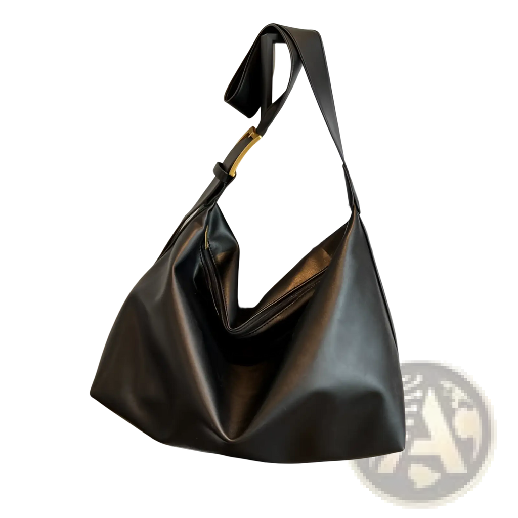 Black leather hobo bag with gold-tone metal buckle on strap for stylish shoulder use