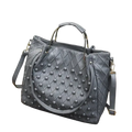 Gray leather quilted shoulder bag with silver hardware and decorative studs showing pocket interior details