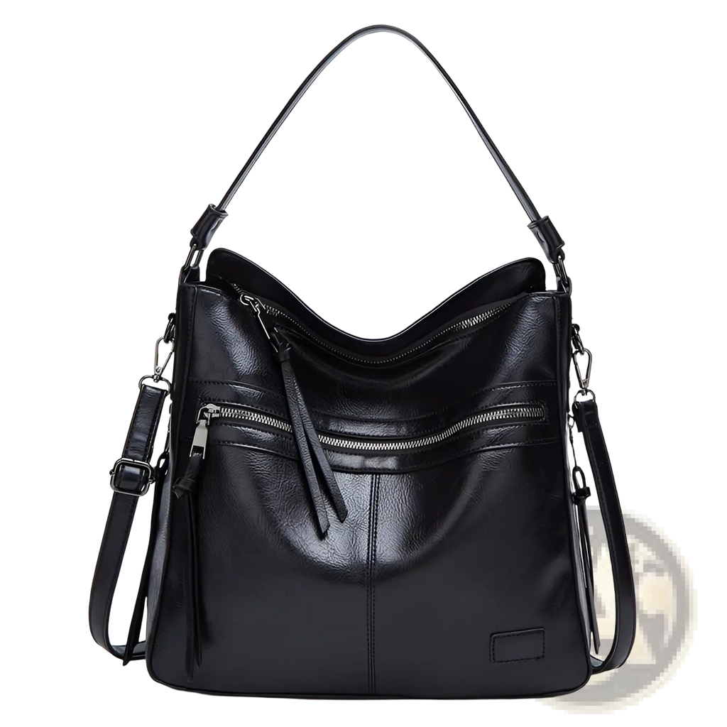 Black leather shoulder bag with curved top handle, adjustable strap, and multiple zippers for secure crossbody use