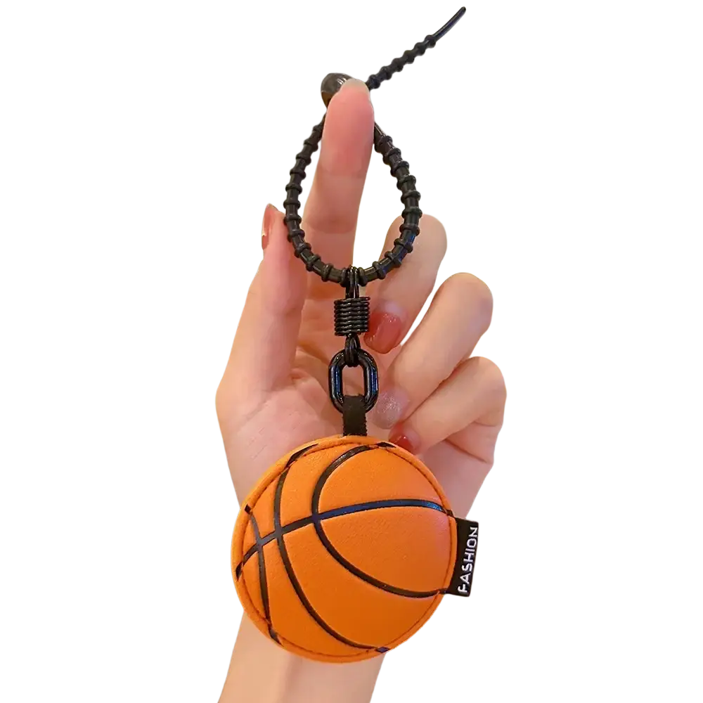 Leather sports ball keychain set bag charm featuring an orange basketball shape with black stitched lines and braided cord