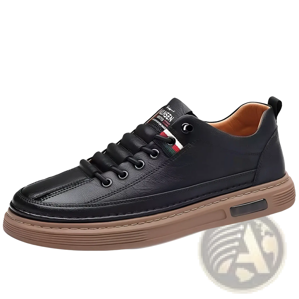 Black leather low-top sports sneaker with cushioned tan rubber sole and logo patch on the tongue