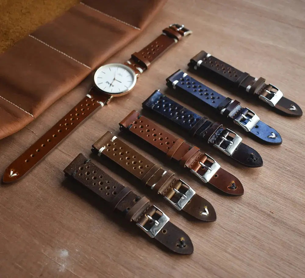 Handmade perforated crazy horse leather watch straps in brown dark blue and black with silver toned buckles