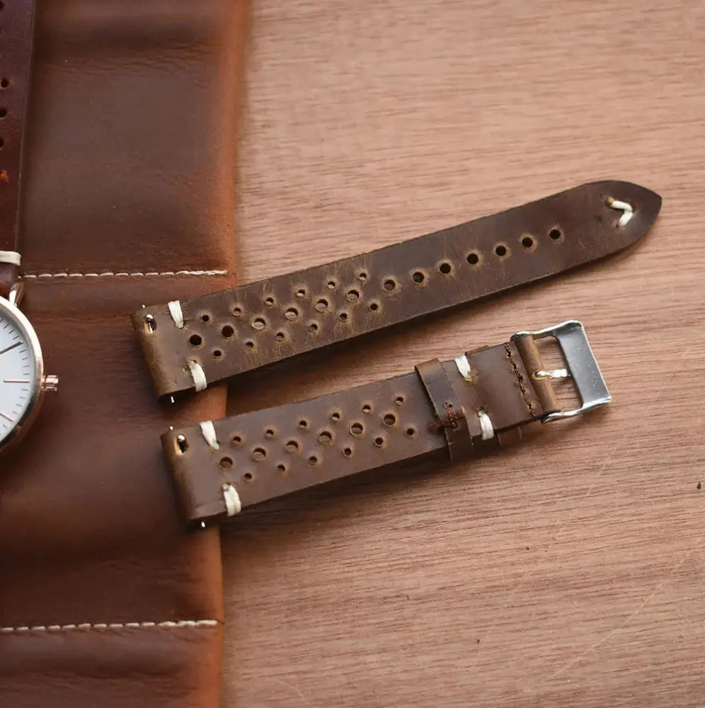 Handmade perforated crazy horse leather watch strap in brown with silver buckle and breathable design