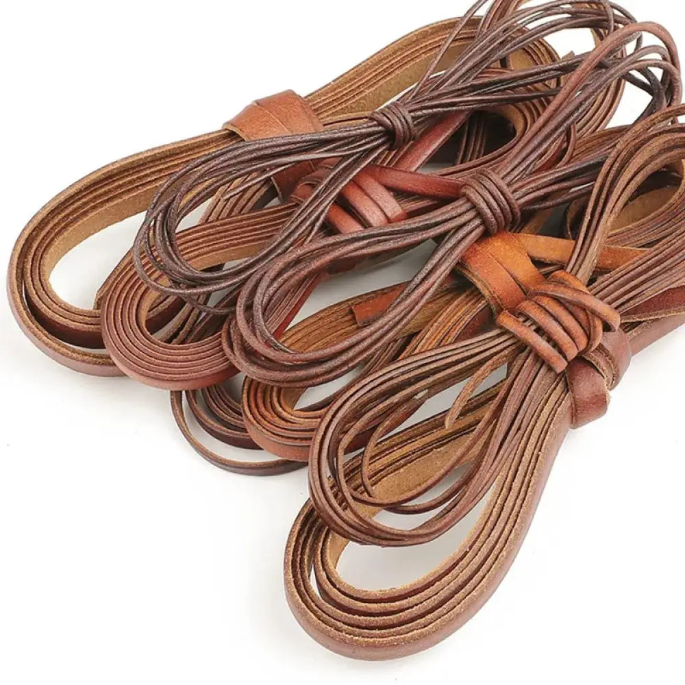 Handmade genuine leather cord coiled brown leather straps with smooth textured finish and visible edge stitching for diy projects