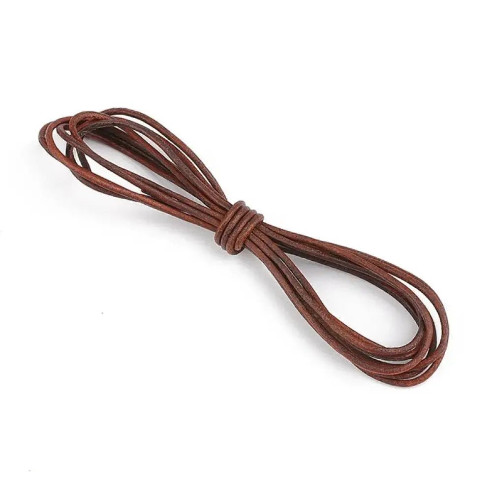 Handmade genuine brown leather cord neatly coiled and tied in a knot for diy crafting projects