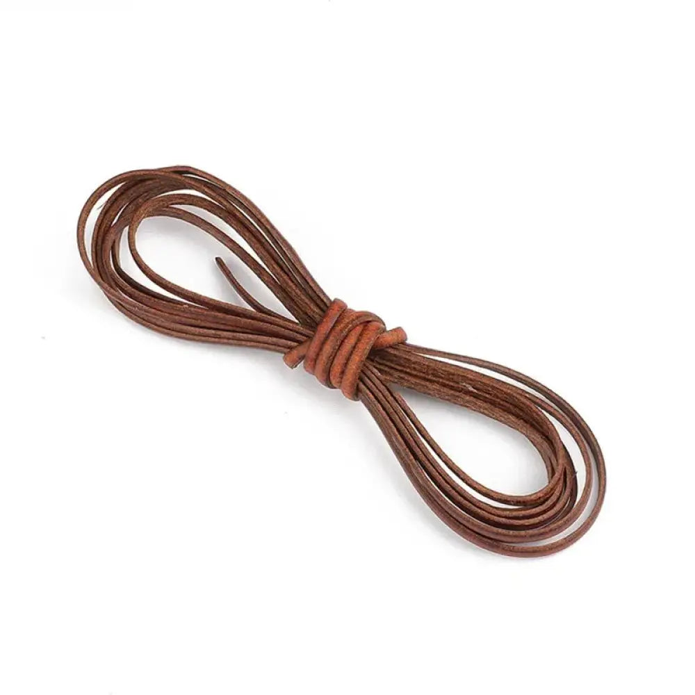 Handmade genuine leather cord coiled and tied in a knot in brown for diy crafting projects