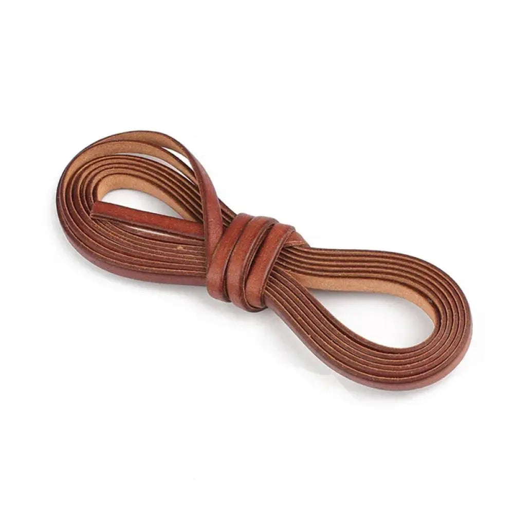 Handmade genuine leather cord in tan with smooth texture and subtle stitching for diy crafting projects
