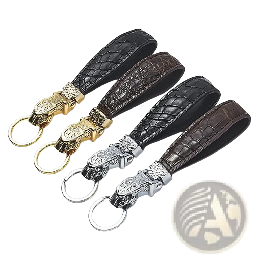 Set of four crocodile-patterned leather keychains with gold silver and black metal tiger head clasps for luxury car keys