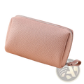 Leather toiletry bag for women mini cosmetic pouch in soft pink textured leather with silver zipper and matching pull tab