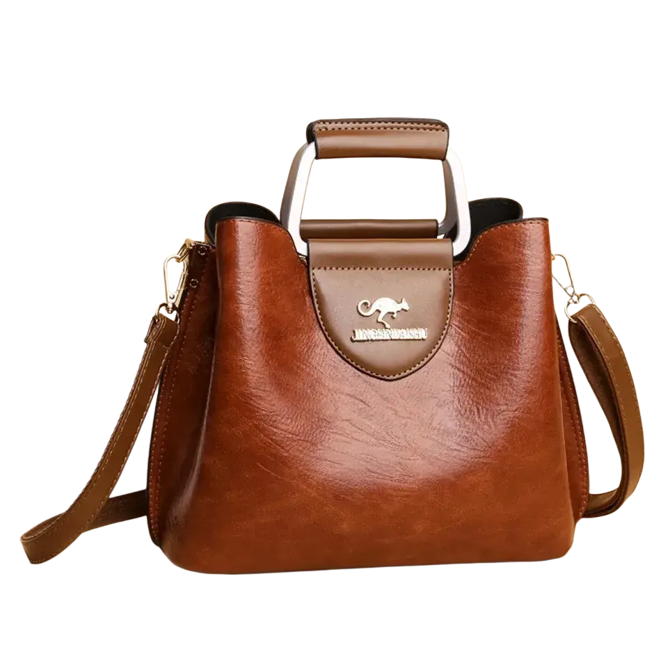 Brown leather tote bag with silver kangaroo logo plaque metal handles and a pocket interior for organized storage