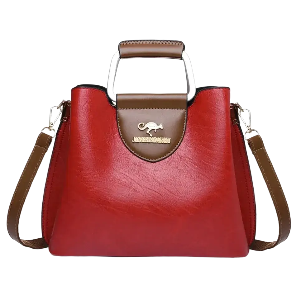 Red and brown leather tote bag with silver kangaroo logo plaque and pocket interior for organized storage