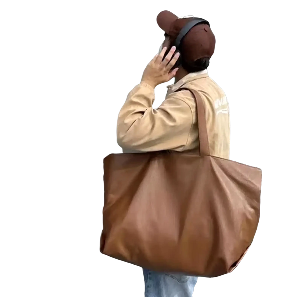 Brown leather tote bag with a single shoulder strap large capacity commuter shopper for daily use