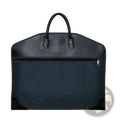 Black leather-trimmed waterproof travel garment bag with dark blue textured fabric and front zipper pocket for business use