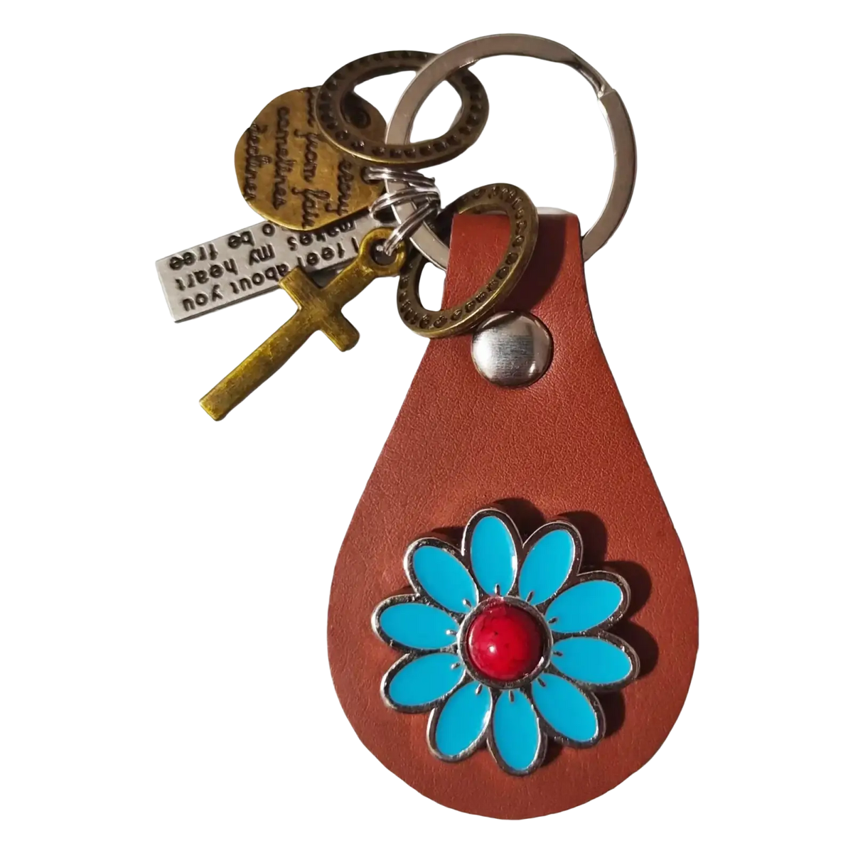 Brown leather keychain with turquoise enamel flower featuring a red center and metallic accents gift charm