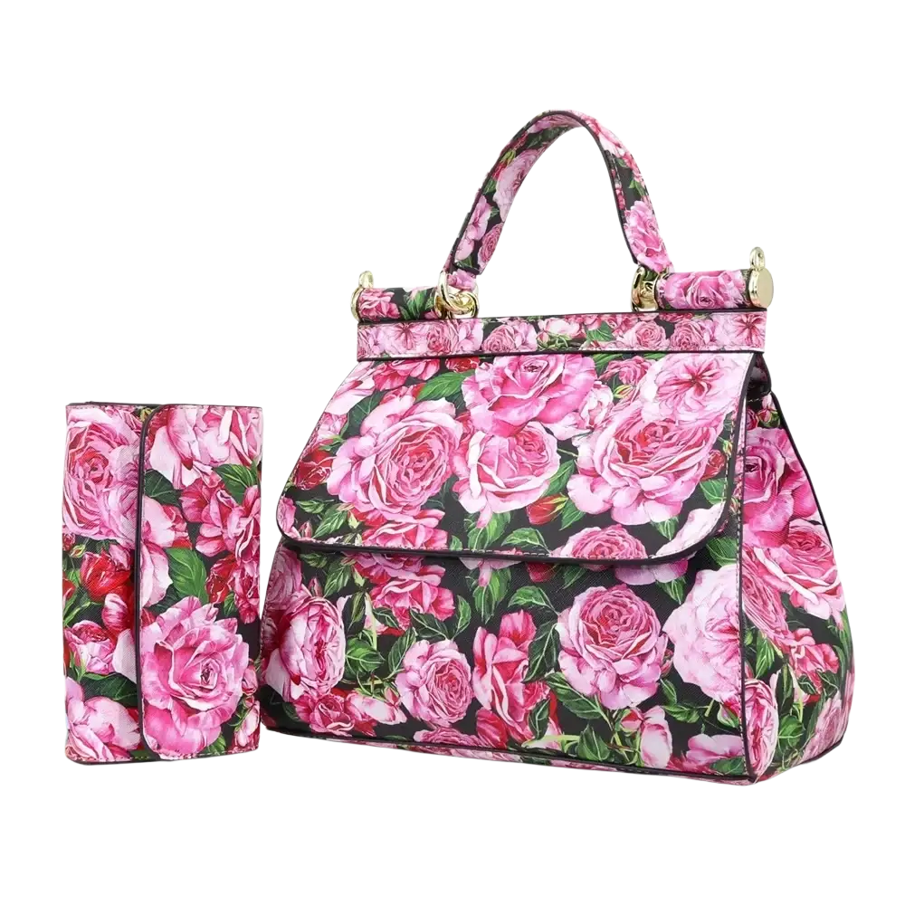 Leather vintage art shoulder bag in pink rose-patterned leather with gold-tone hardware by Dolce & Gabbana