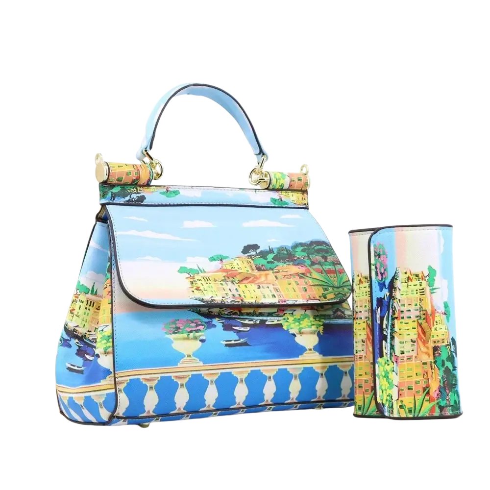 Leather vintage art shoulder bag with vibrant blue and yellow coastal town print and gold-tone hardware