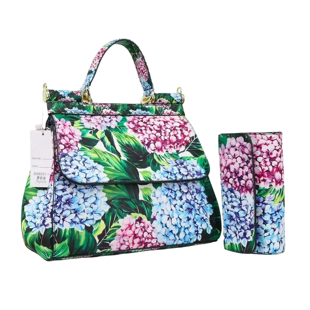 Leather vintage art shoulder bag with vibrant hydrangea print gold-tone hardware and matching cylindrical wallet