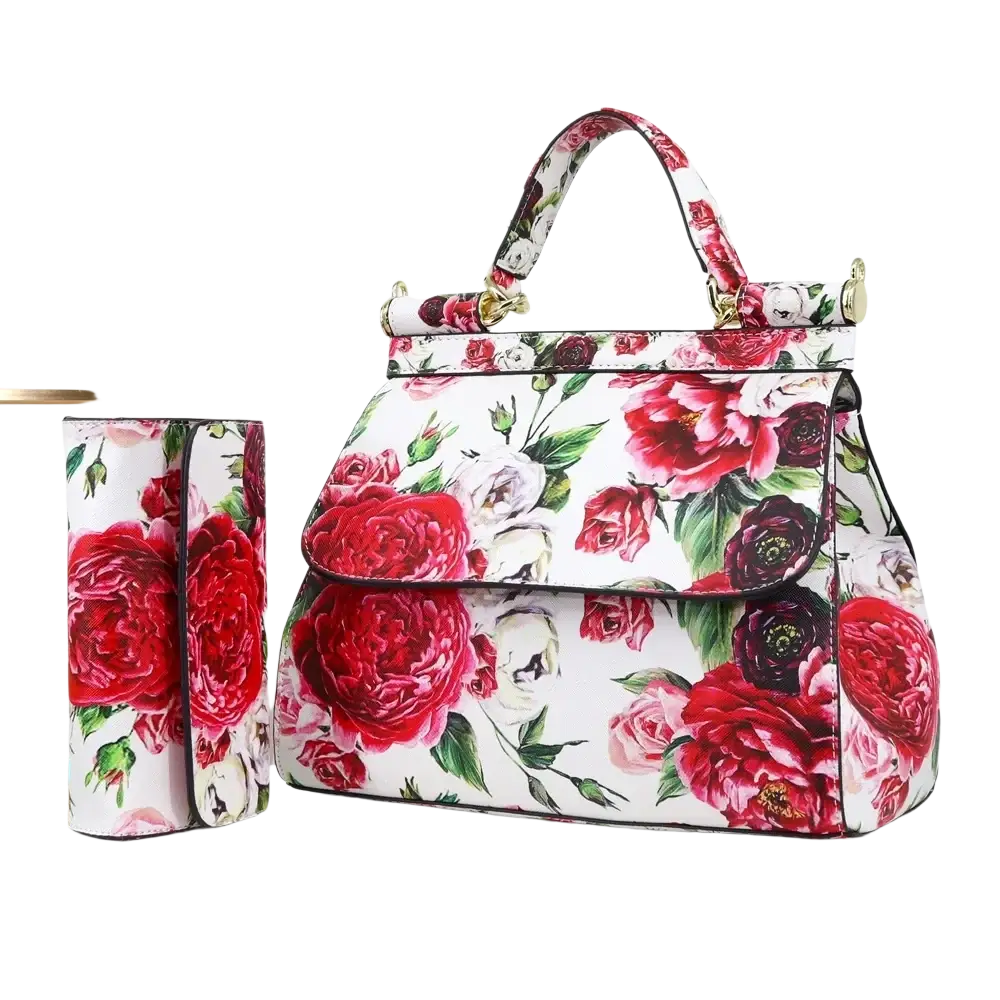 Leather vintage art shoulder bag with vibrant red and white floral pattern and gold-tone hardware made of leather
