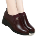Leather wedge pumps brown leather ankle boots with ribbed knit cuff and small metallic emblem for casual comfort