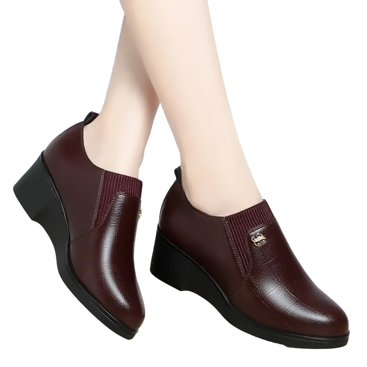 Burgundy leather wedge ankle boots with ribbed elastic side panel and metallic buckle detail for casual comfort