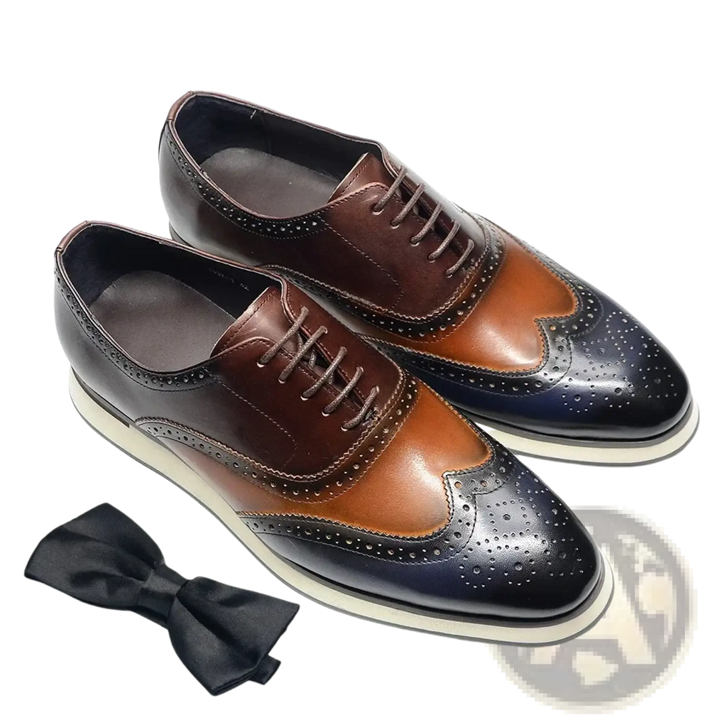 Leather wingtip brogue oxford sneakers in brown and black two-tone leather with perforated detailing