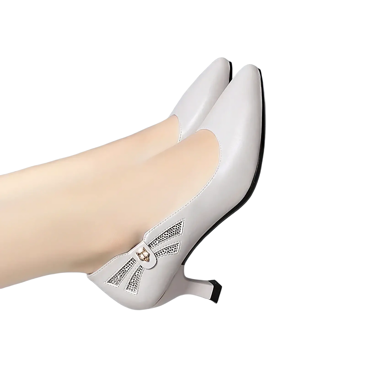 White leather mid heel work pumps featuring a cat face embellishment on the side
