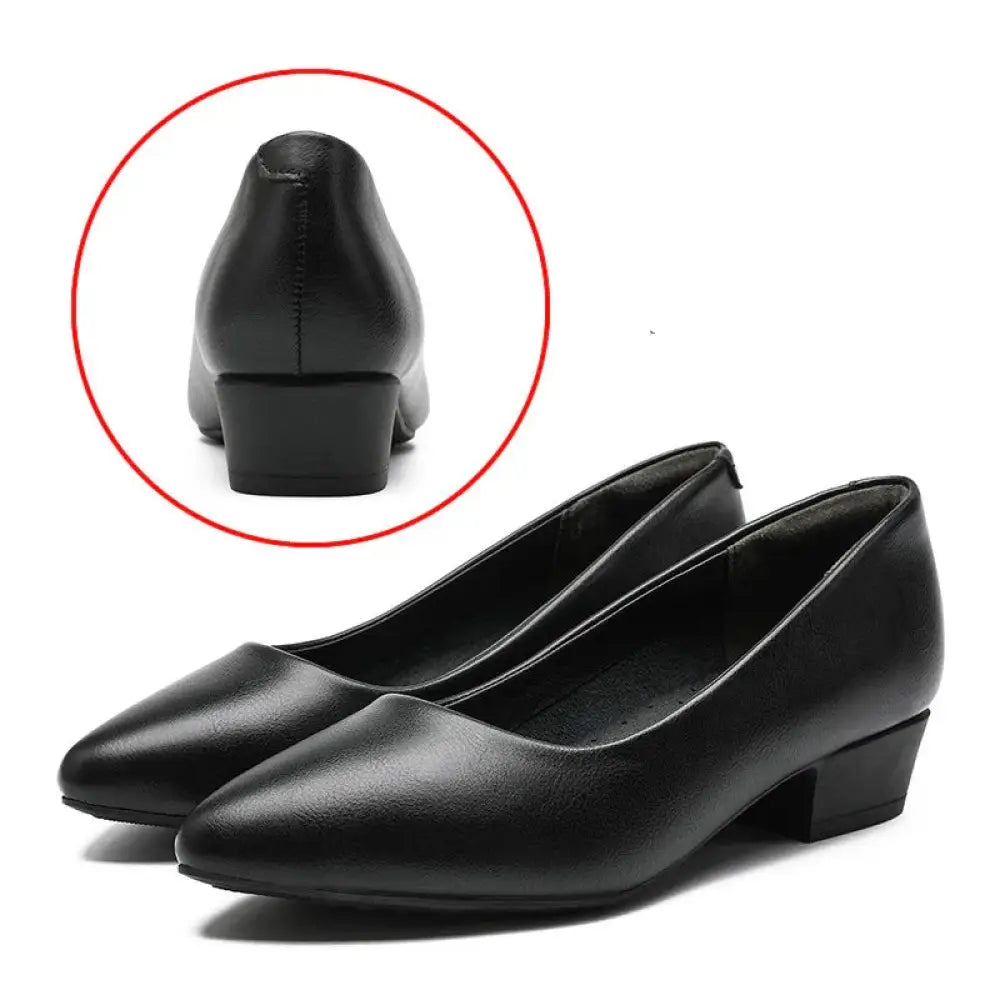 Black leather women’s pointed toe office pumps with low block heel ideal for professional work settings