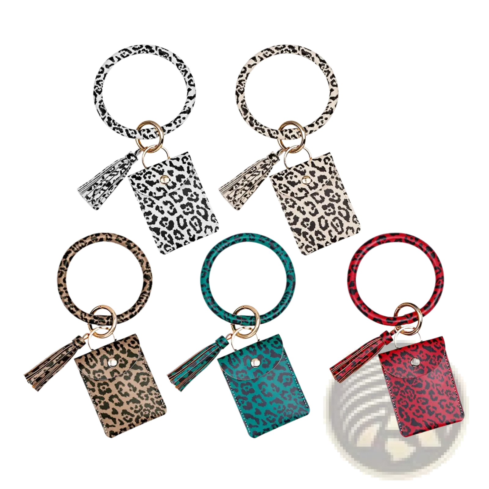 Leather wristlet keychain card holder in leopard print leather with circular ring pouch and coordinating tassel accents