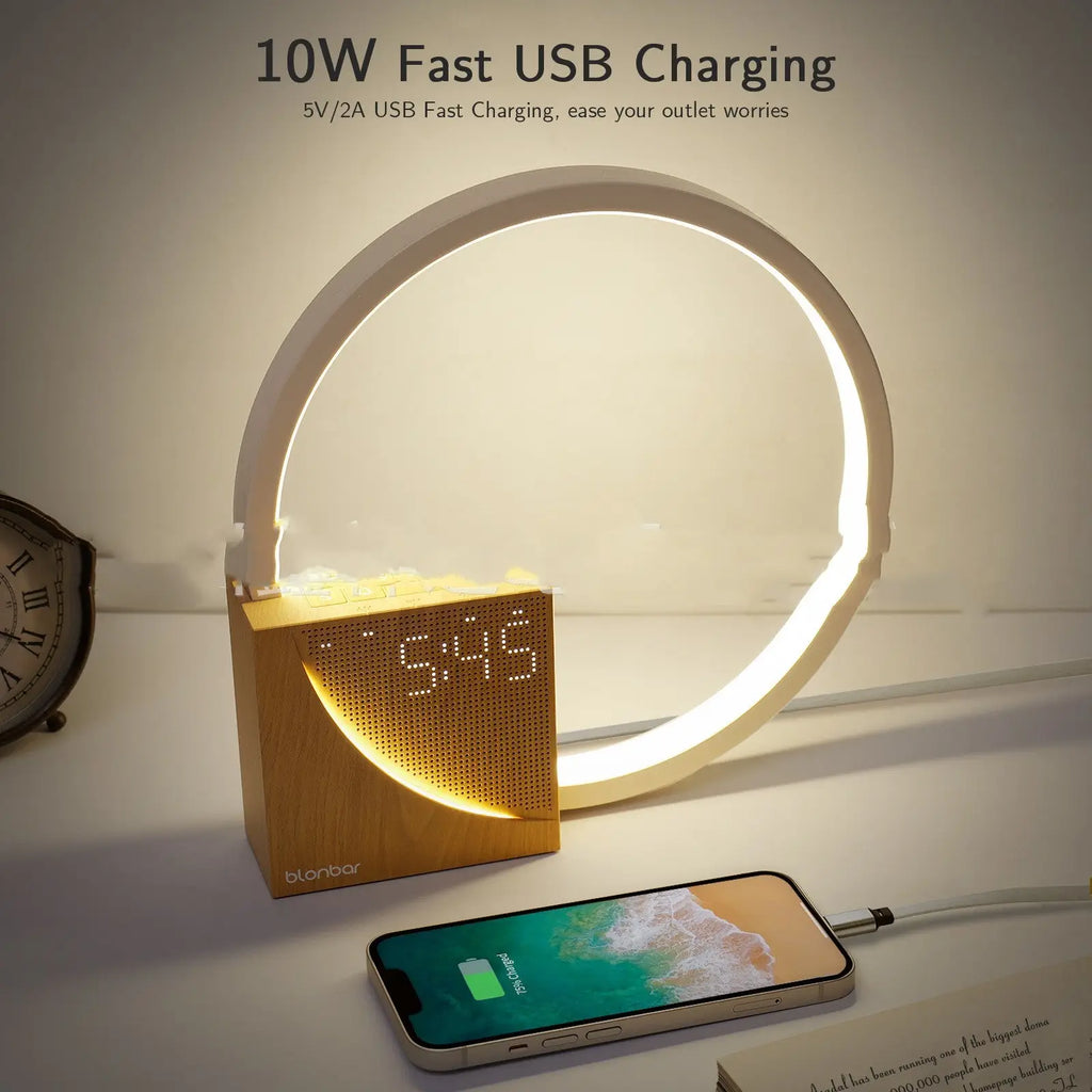A sleek minimalist wooden led bedside lamp with circular led ring and digital clock display with alarm and natural sounds