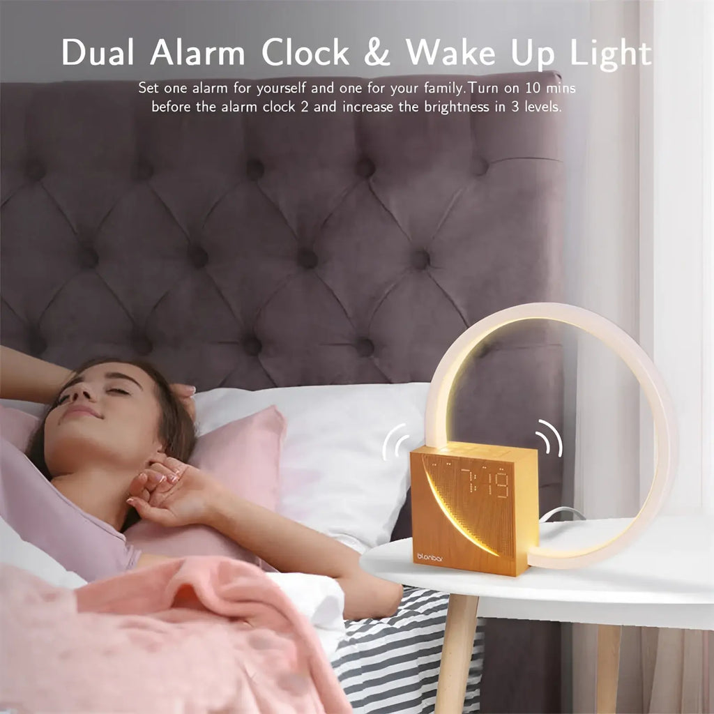 Gold-colored led bedside lamp with alarm clock featuring a circular led light ring and modern minimalist design
