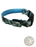 Led camouflage glowing dog collar with teal and black pattern, blue lining, black buckle, and silver metal ring